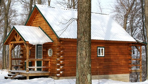 Snow covered Maple Lane Cabin